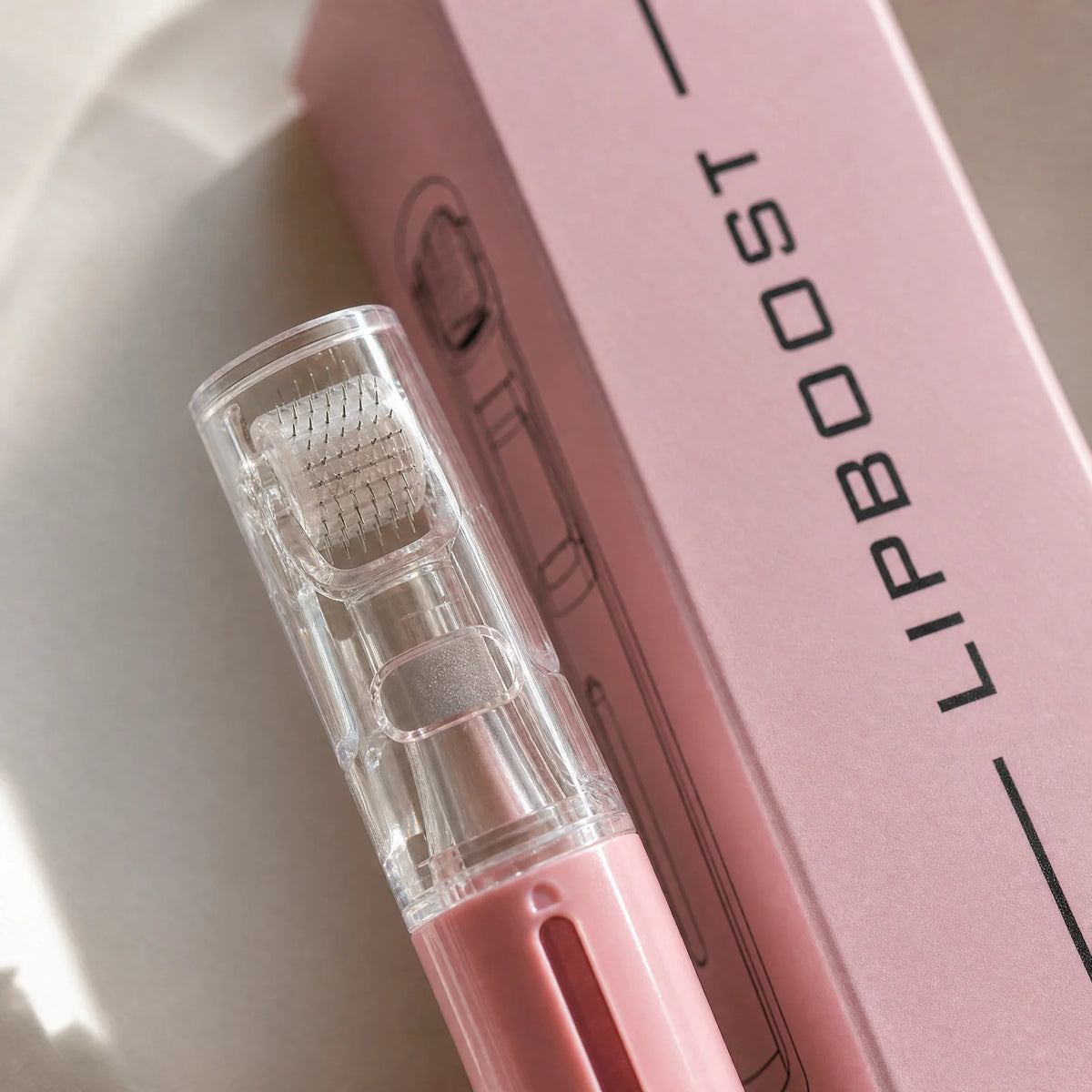 Lipboost · Rodillo de microagujas para labios – textura en detalle